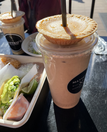 Horchata drink with a pumpkin pie on top